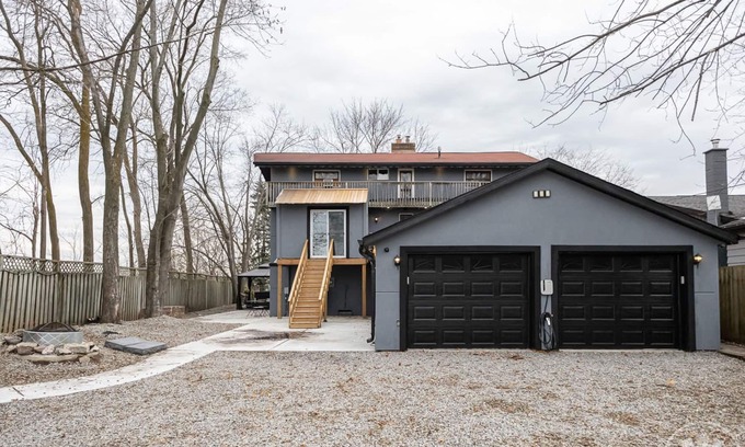 Alcona Cottage | waterfront cottage on lake simcoe w/ firepit hottub and large deck