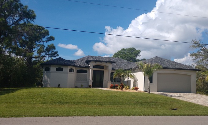 Port Charlotte House | Waterfront Custom Home with Gulf access & Heated Pool