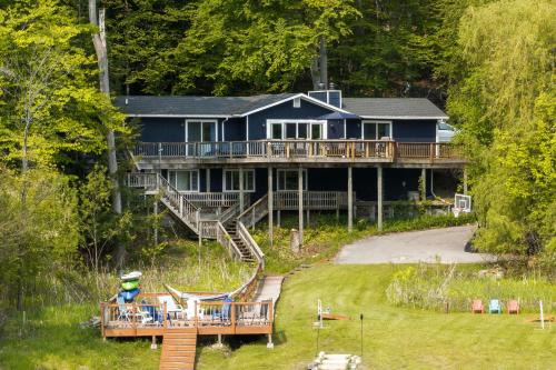 Rapid City House | Waterfront Deck and Dock Torch Lake Home!