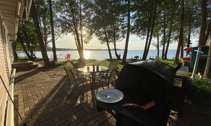 Sturgeon Bay House | Waterfront gem, sandy beach, modern kitchen, large great room, free firewood