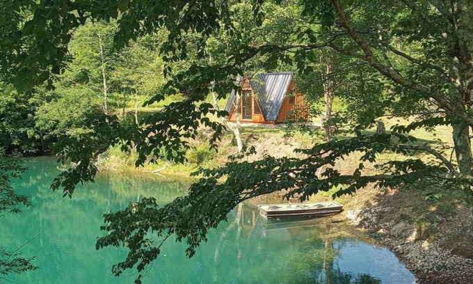 Mount Storm Cabin | Waterfront Glamping Cabin On Private Blue Water Mountain Top Lake