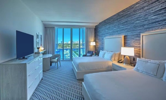 Central Beach Hotel | Waterfront Haven: Marina Balcony, Pool, Minutes from Galleria Mall Shops