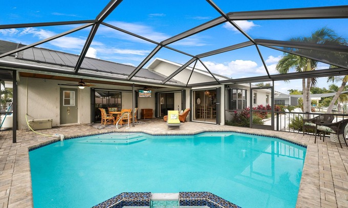 Lochmoor Waterway Estates House | Waterfront Heated Pool Home Retreat, Direct Gulf Access, Special Deals