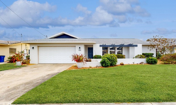 Lochmoor Waterway Estates House | Waterfront home with pool, bikes, grill, fireplace, internet, W/D, & central AC