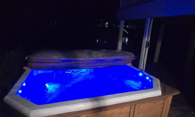 Spring Lake House | Waterfront home Spring Lake hot tub, firepit, gas grill fishing
