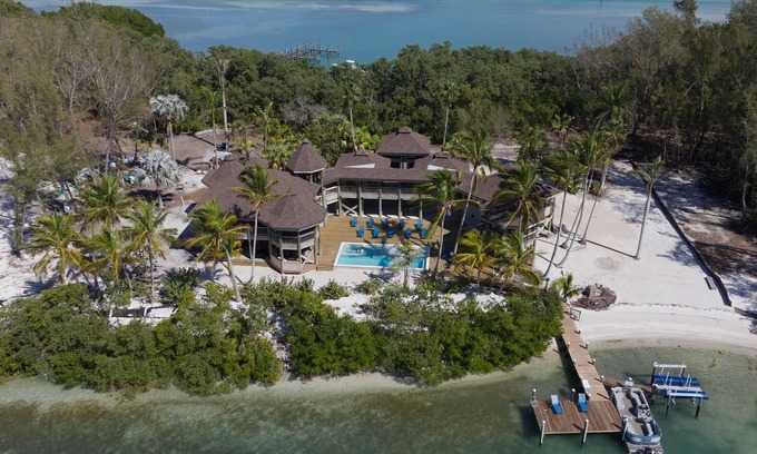 Longbeach Village House | Waterfront home with private beach, a private pool, and water activities! Moku