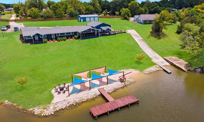 Highlands House | Waterfront Home with Boat Launch and Dock, Pool & basketball/pickleball court mini golf, playground