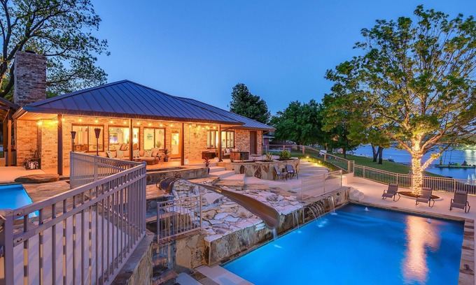 Kingsland House | WATERFRONT HOME WITH*2 POOLS,WATERSLIDE, &HUGE BOAT DOCK & LAY OUT AREA! FUN!