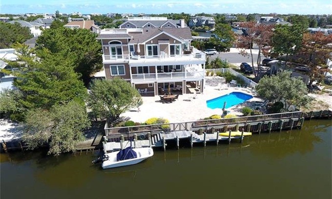 Loveladies House | Waterfront luxury beach house, short walk to the beach. The perfect resort! 2025