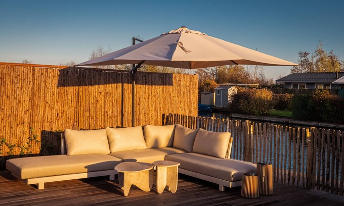 Baambrugse Zuwe Ski Chalet | Waterfront luxury tiny home near Amsterdam with spacious private garden