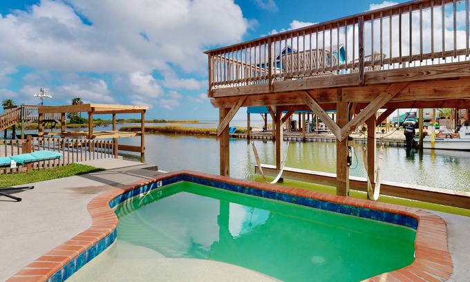Flour Bluff House | Waterfront monthly rental with private pool, boat slip & 2 SUPs