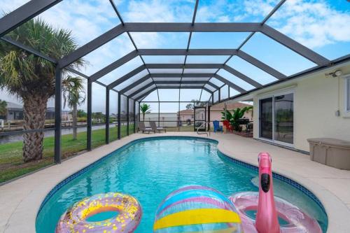 Port Charlotte House | Waterfront Oasis -3BR - Heated Pool -BBQ -Private Dock