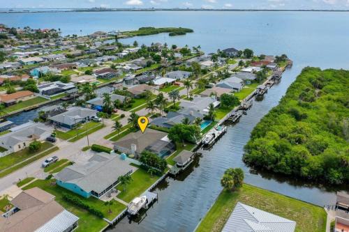 Merritt Island House | Waterfront Oasis with Private Heated Pool & Dock