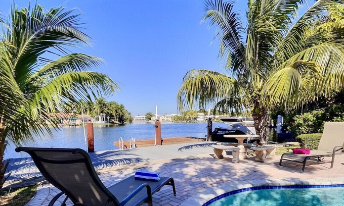Coral Shores Villa | Waterfront Paradise: Heated Pool, Marina, Kayaks, 1 mile to the beach