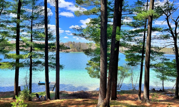 Waupaca House | Waterfront Paradise! Boat available for rent.
