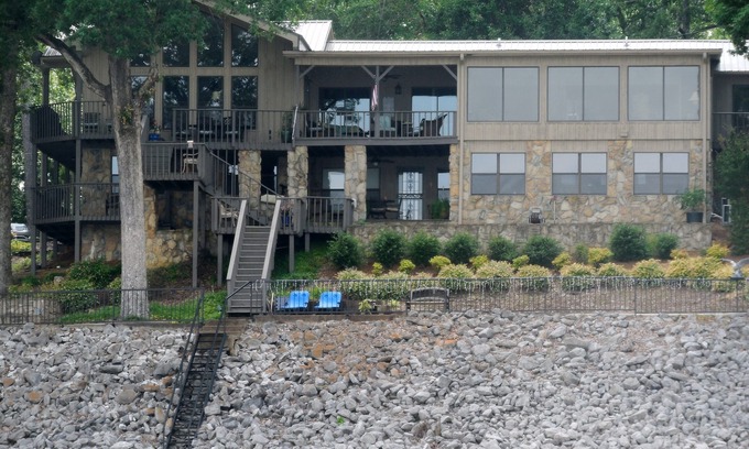Oakland House | Waterfront property located at Point Pleasant on Enid Lake