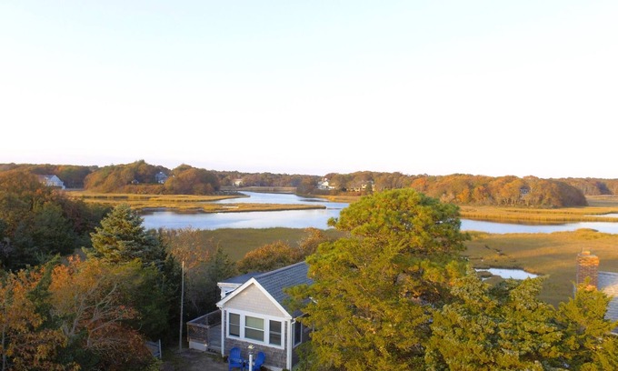 Centerville Cottage | Waterfront! Riverfront delight. 2 BR, private, decks. Steps to Craigville Beach