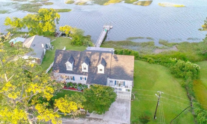 Shallotte House | Waterfront tranquility! 3 Bedroom, 2 Bath with Sunroom
