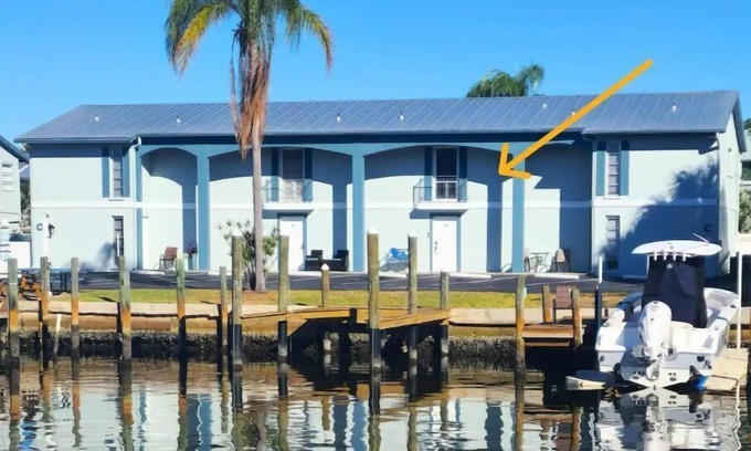Whitney Beach House | Waterfront view romantic with a boat slip perfect for adventure and relaxing