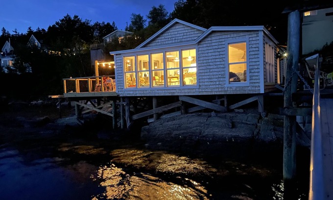 Georgetown Cottage | Waterfront, west facing, modernized fisherman’s cottage perched on the water.