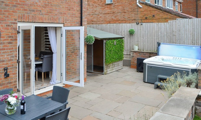 Langtoft Cottage | We love the open plan living area with wood burner.