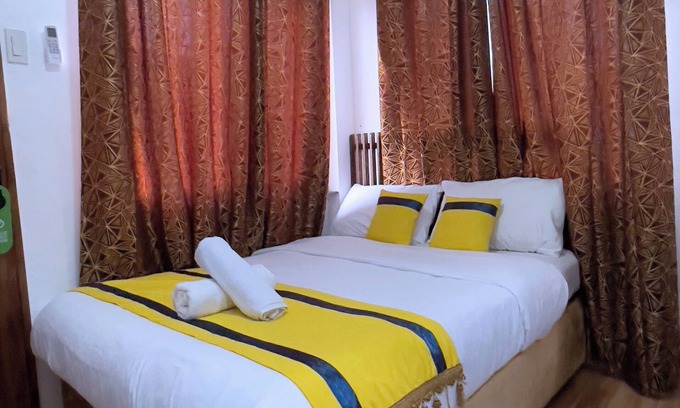 Mactan Export Processing Zone Apartment | Welcome to our budget-friendly hostel, where you can enjoy an affordable stay.