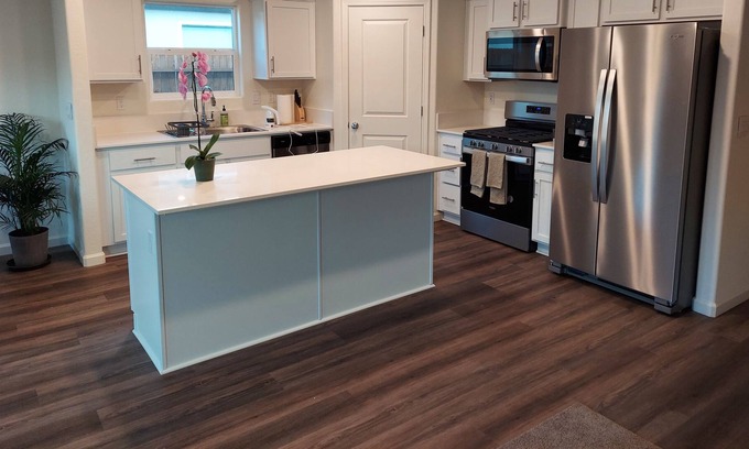 Merced House | Welcome to our cozy 4 bed home with modern amenities.