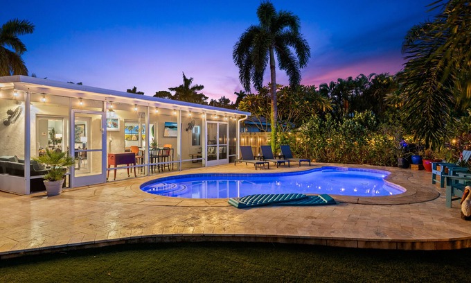 Poinsettia Heights House | Welcome to Pelican Landing, A Cozy Tropical Heated Pool Home!
