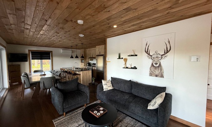 Riviere-Rouge Ski Chalet | Welcome to your haven of peace, a magnificent chalet nestled in the heart of nature.