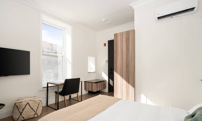 Latin Quarter Apartment | Well-equipped bedroom in downtown