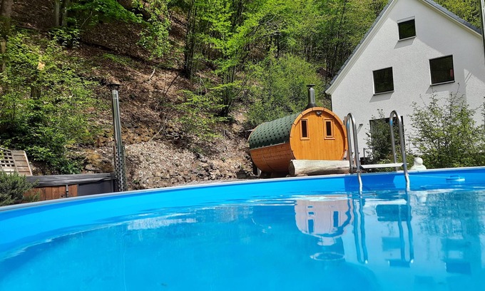 Schladern House | Wellness holiday home with a covered pool, hot tub and barrel sauna in the Rosbachtal