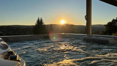 Wasungen House | Wellnorama 1 - WellnessFerienhaus mit Pool, Sauna und eigenem Whirlpool mitten in Deutschland