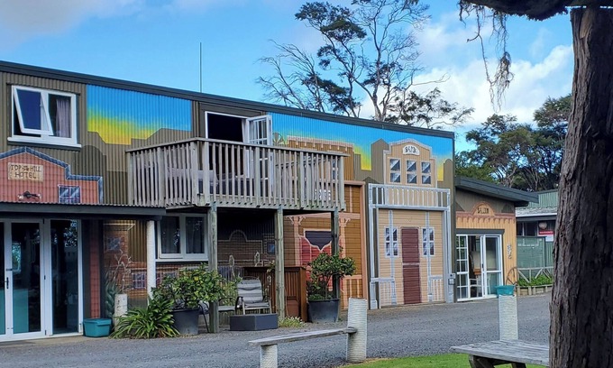 Coromandel House | Western Theme Mural,Private,Unique,Rustic,Sea Views,Sunsets,Bush,Pet friendly.