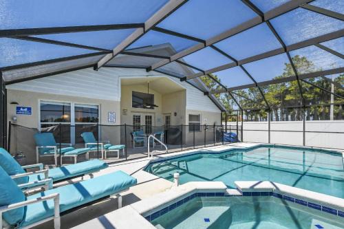 Windsor Palms House | Wheelchair accessible Lakeview 4BR house with pool spa themed rooms game room