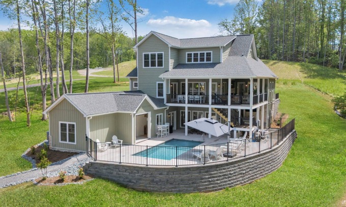 Moneta House | Whispering Pines Estate, Waterfront Luxury w/Covered Verandas + Heated Salt Pool, Hot Tub, Dock!