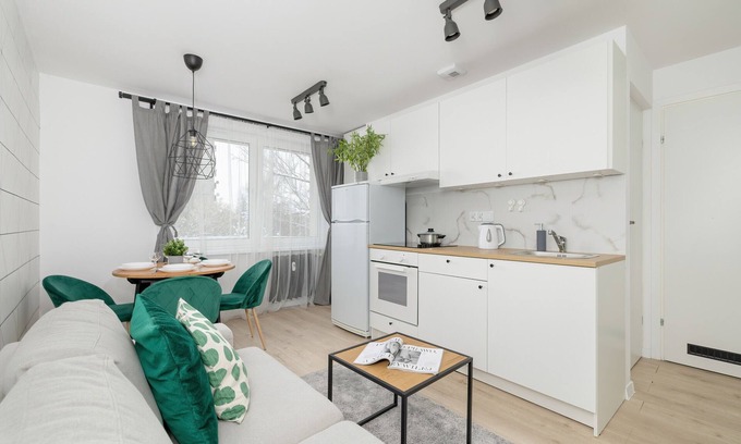 Brynow Apartment | White and Green Apartment by Renters