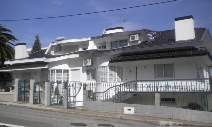 Santa Maria da Feira House | White House with apartment of 95 meters, with swimming pool, terrace and churasqueira.