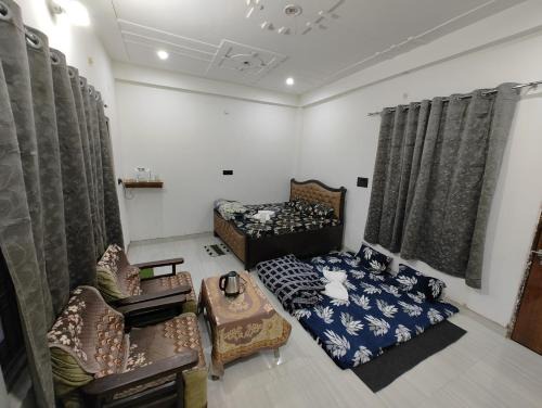 Jhusi Apartment | White House Room & Balcony