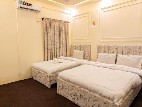 Gulshan-E-Jamal Bed & Breakfast | White Rose Family BNB - Near Agha Khan Hospital