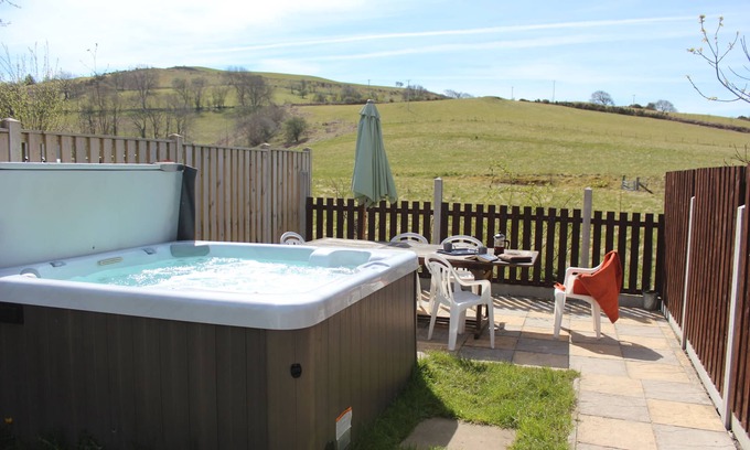 Tregaron House | Whole house sleeps 5, private garden with hot-tub, pet friendly.