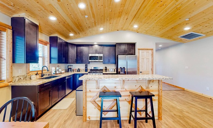 Woodlands House | Wilderness stay with enclosed yard, hammock, grill, game tables, & fireplace