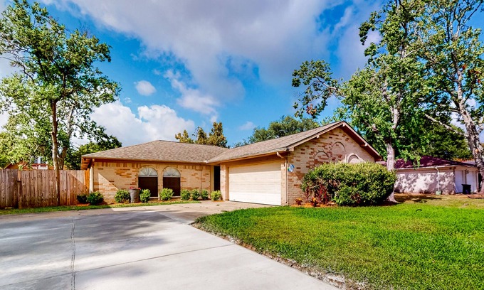 League City House | Windward Wonders | House in League City with an enclosed yard
