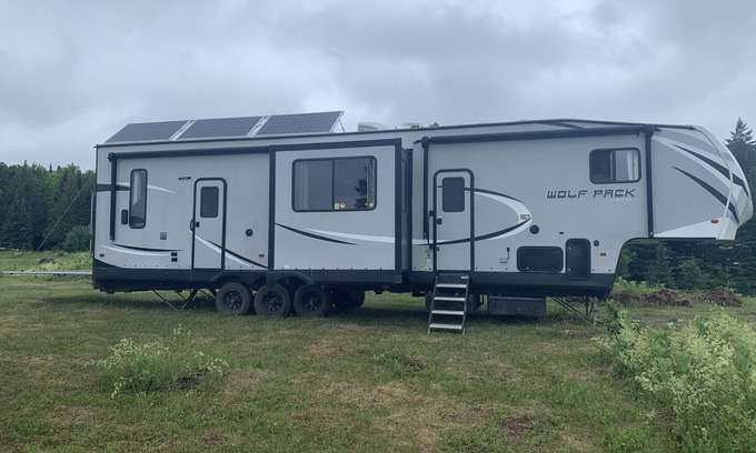 Brudenell House | Wolf pack for rent in the prairie with 2 person hot tub