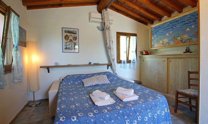 Castiglione della Pescaia House | Wonderful private villa with A/C, hot tub, TV, veranda, pets allowed, panoramic view and parking