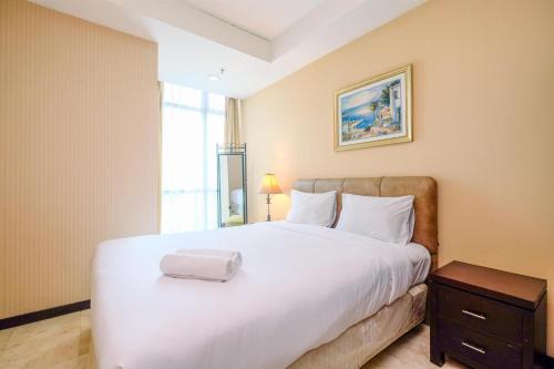 East Kuningan Apartment | Wonderful and Homey 2BR Apartment Bellagio Residence By Travelio