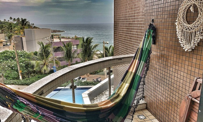 Rio Vermelho Condo | Wonderful beach view 1 bed apt incredible location AC GYM POOl WiFi car garage.