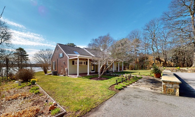 Cotuit House | Wonderful waterfront getaway with furnished deck, pond access, kayaks & WiFi