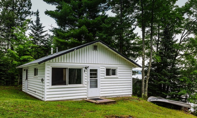 Gwinn Cottage | Wooded Lakeside Cottage ,Fishing, Snowmobiling, Hunting, Boats, Hot Tub