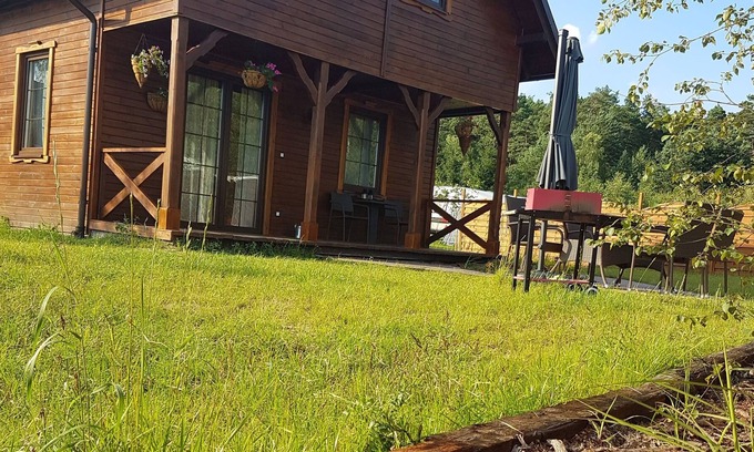 gmina Osiek House | Wooden Holiday Home in Skrzynia with Terrace