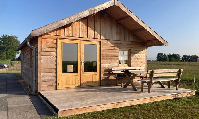 Tjerkgaast House | Wooden House in Friesland with Farm Experience